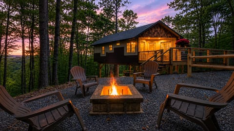 Cozy woodland cabin with fire pit, deck, and stunning sunset views