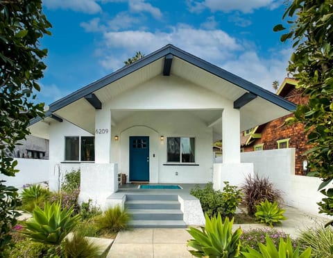 Built in 1912, this California Craftsman bungalow allows you to appreciate early 20th century architecture while enjoying modern amenities. Shrouded in edible gardens, a fire pit, grill, and flower trellis, the exterior is the true gem of this home.