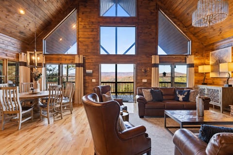 Stunning vaulted great room with mountain views and cozy cabin charm