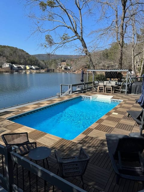 Lakefront home on Lake Arrowhead: 3 stories with private heated pool, dock, lake access, kayaks, fire pit, grill, dual master bedrooms, multiple decks, screened-in porch, gated with resort amenities: golf, tennis/basketball/volleyball courts, pools..