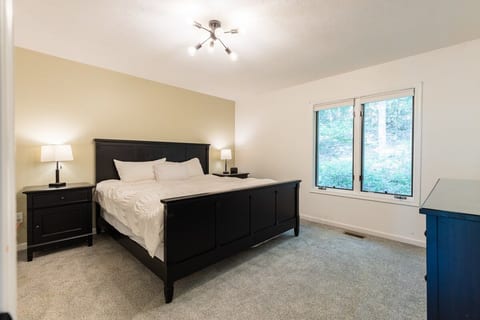 The master bedroom has a large king bed with super comfy pillows, mattress, and goose down comforter. A large closet and dresser are available for your clothes. The master suite also has an attached bathroom with full shower, toilet, and sink.