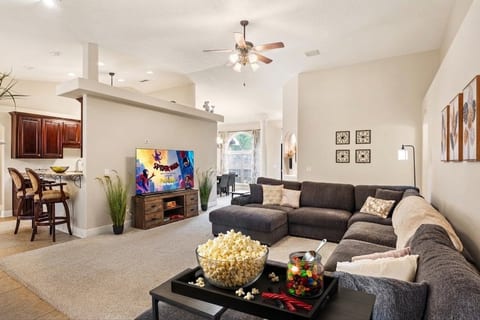 Popcorn's popped, candy's out, and the sectional has room for everyone to pile in. Movie night here means no one wants to leave the couch — or the house