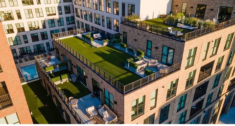 Expansive rooftop terraces with stylish lounge seating and urban views