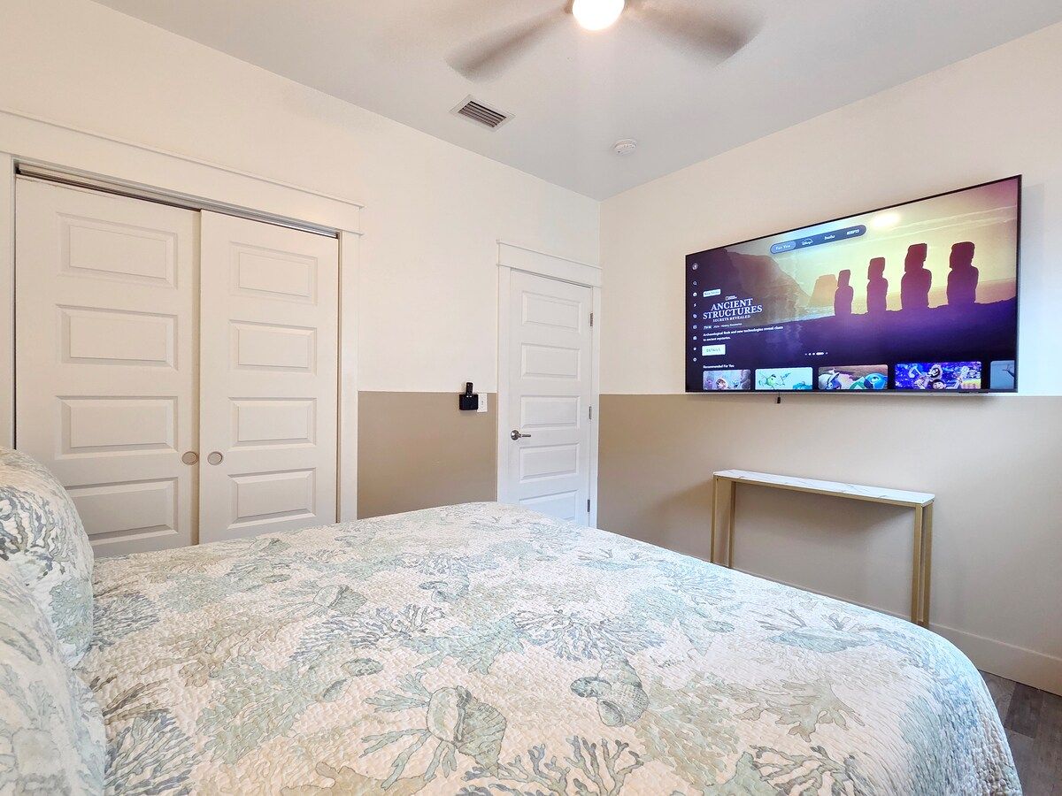2nd Bedroom with King Size Memory Foam mattress, 70" Samsung Smart TV, Night stand w/power strips for hungry phone chargers, ample closet space w/extra pillows and blankets.