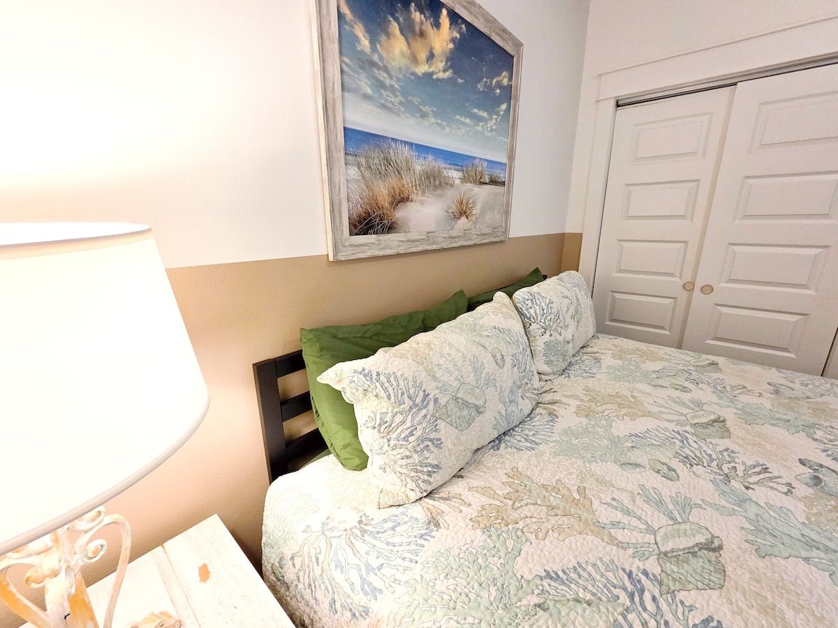 2nd Bedroom with King Size Memory Foam mattress, 70" Samsung Smart TV, Night stand w/power strips for hungry phone chargers, ample closet space w/extra pillows and blankets.