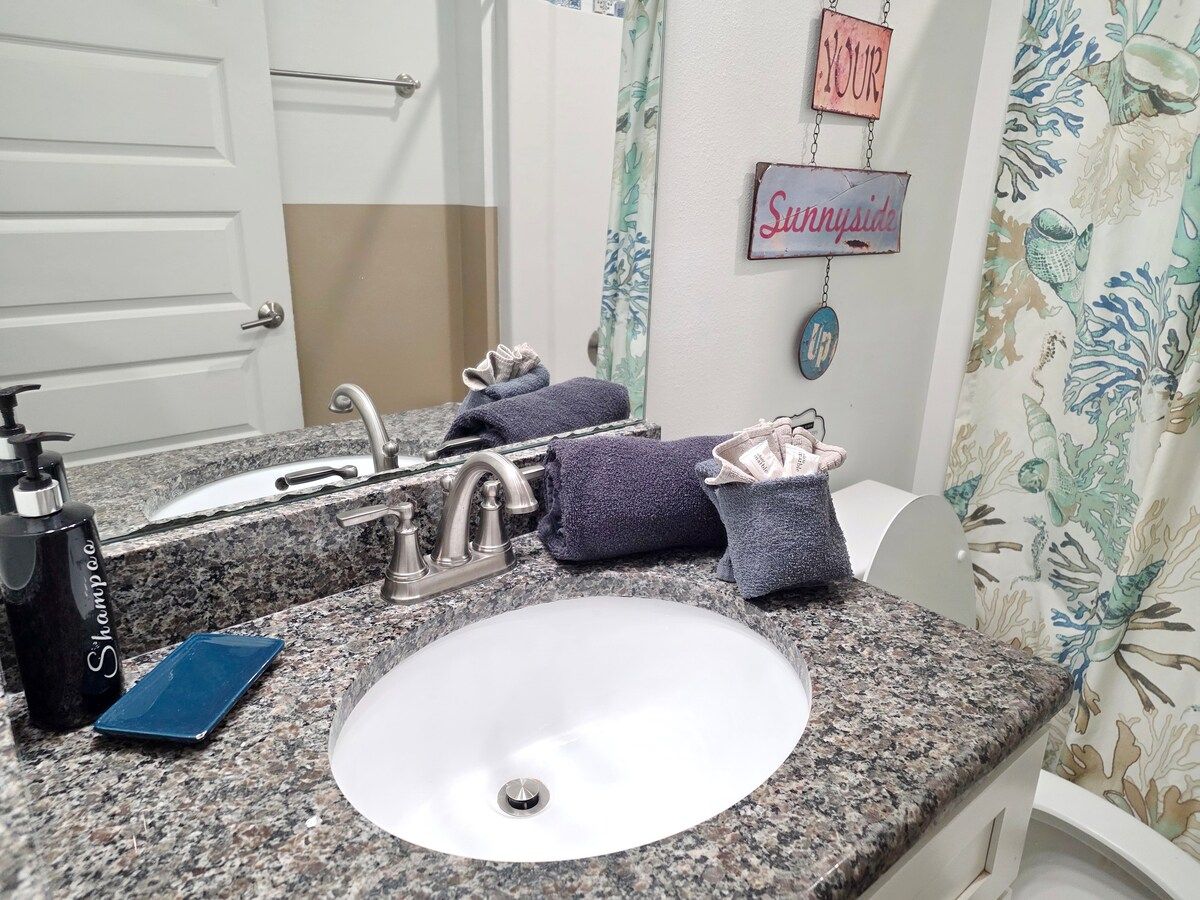 2nd Bathroom w/ Shower Tub Combo, Full size Vanity, and toilet.