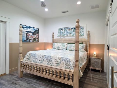 Master Bedroom with king size memory foam mattress, 75" Samsung Smart TV, Night stands w/power strips for hungry phone chargers walk in closet w/extra pillows and blankets, master bath w/ walk in shower and private access to pool.