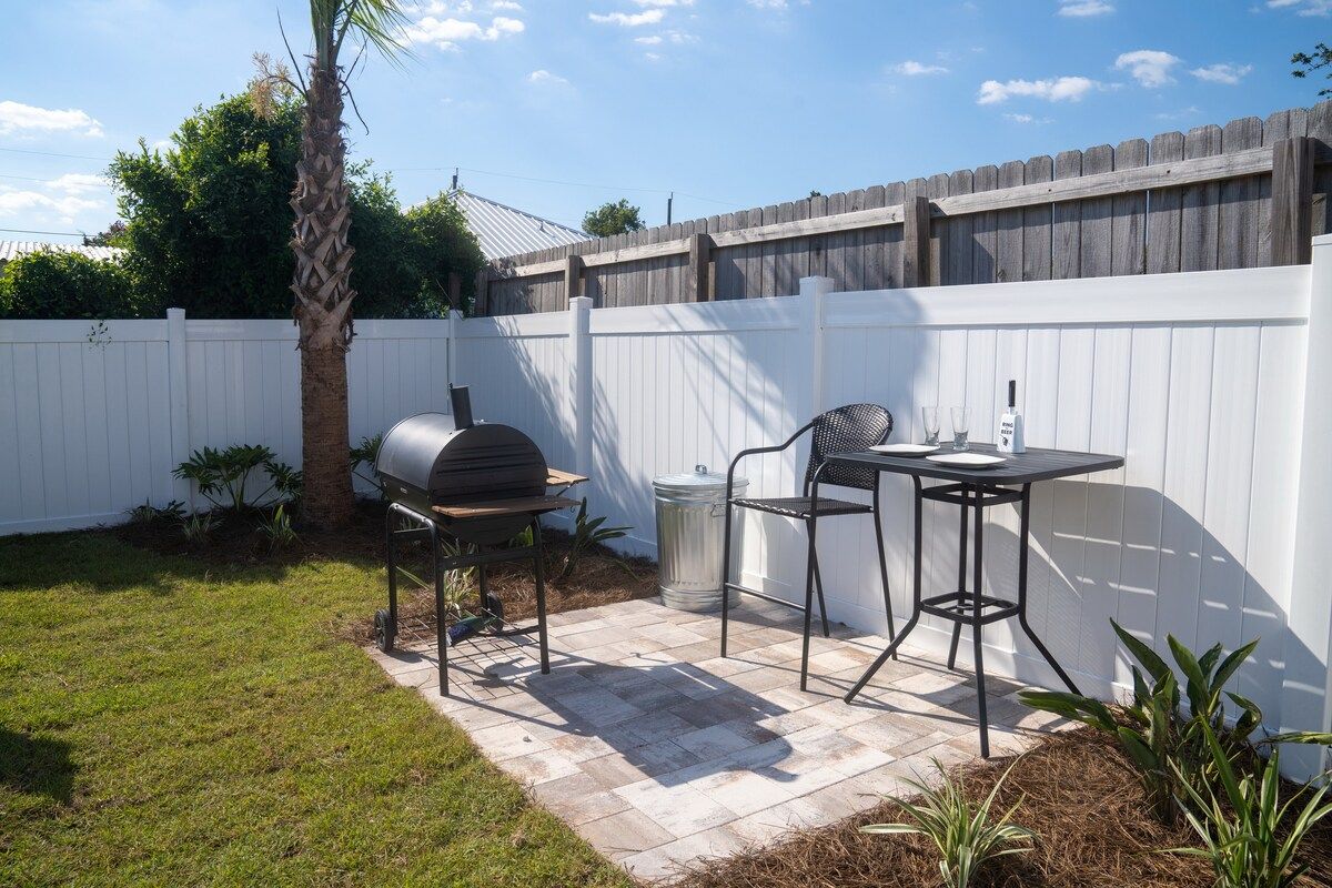 Barbecue charcoal Grill area with prep table and chair for Dad