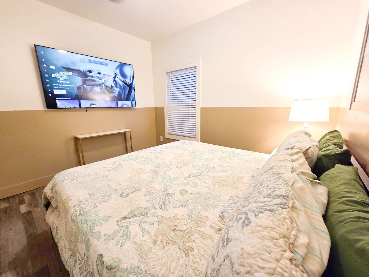 2nd Bedroom with King Size Memory Foam mattress, 70" Samsung Smart TV, Night stand w/power strips for hungry phone chargers, ample closet space w/extra pillows and blankets.
