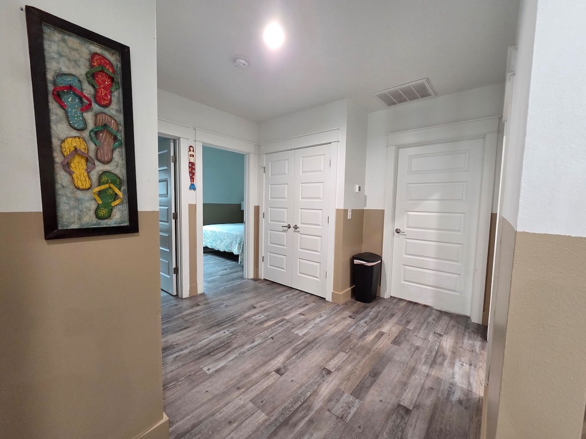 2nd Bedroom with King Size Memory Foam mattress, 70" Samsung Smart TV, Night stand w/power strips for hungry phone chargers, ample closet space w/extra pillows and blankets.
