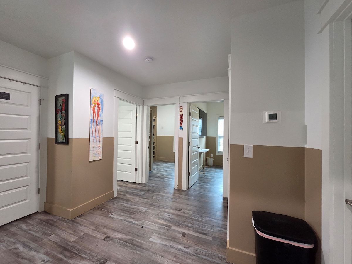 Hallway to Bunkroom, Bathroom 2 and bedroom 2, Laundry Room, and Kitchen