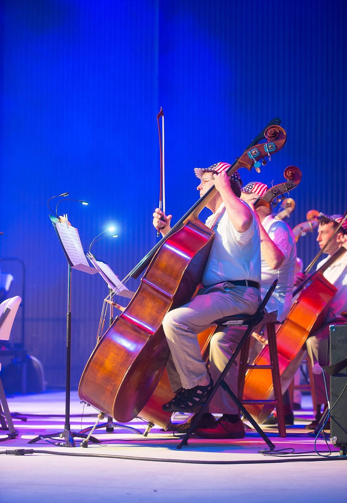 Panama City Pops plays during 4th of July Celebration at Pier Park open air Theatre with a large grass area to sit and enjoy