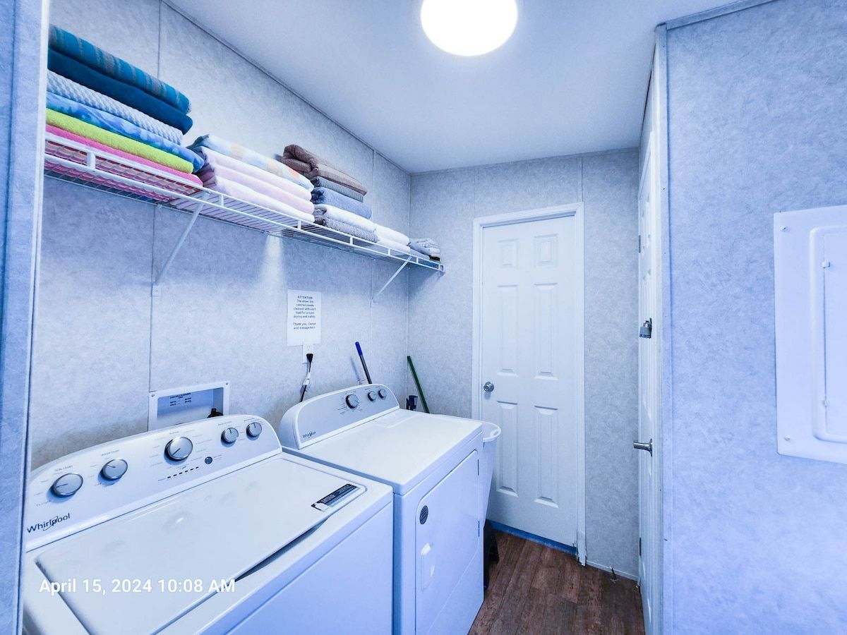 Full size Washer and dryer w/ Vacuum cleaner and broom for unit use only.