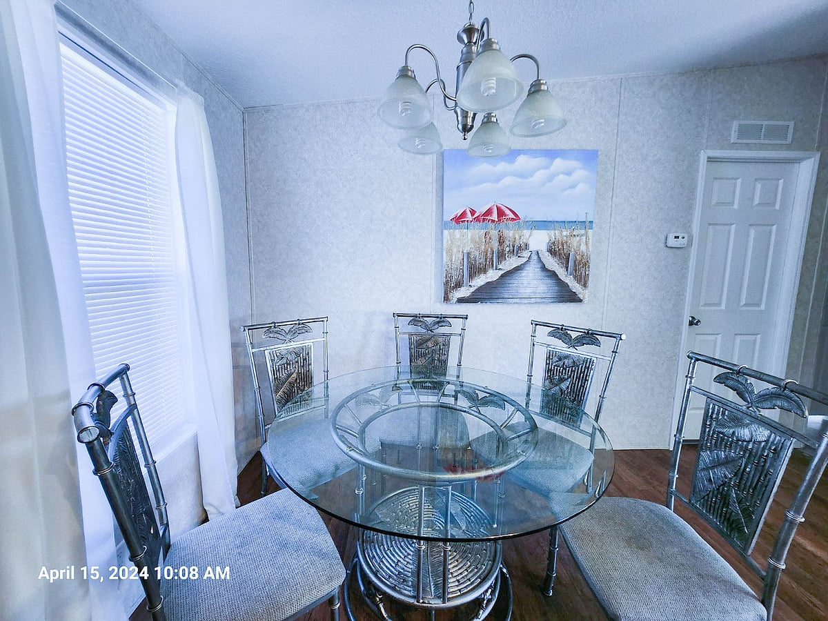 Dining area with room at bar and dining table.