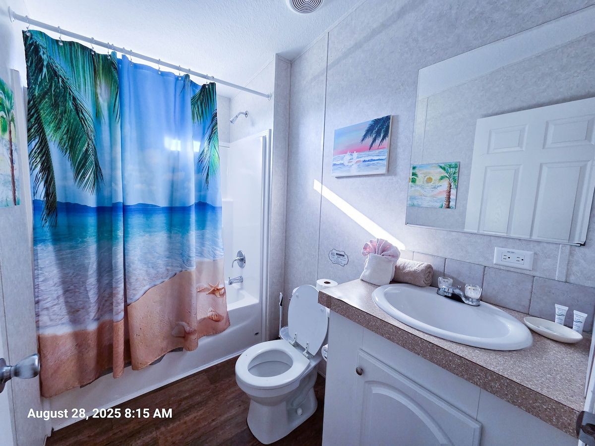 2nd Bathroom with bath tub / shower combo, toilet, & sink