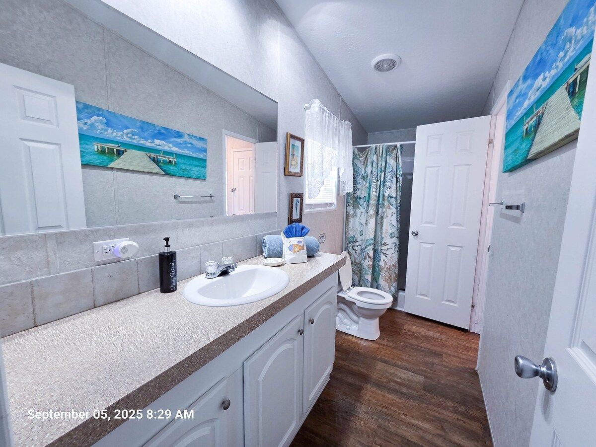 Master Bath with walk-in shower, sink, and toilet. Attached to the Master bedroom