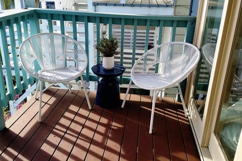 Shaded balcony perfect for morning coffee or afternoon relaxing.