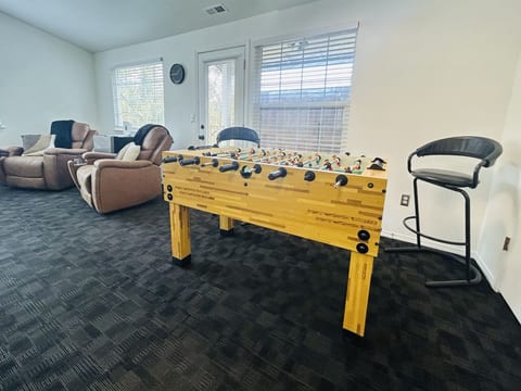 Foosball table and living room view