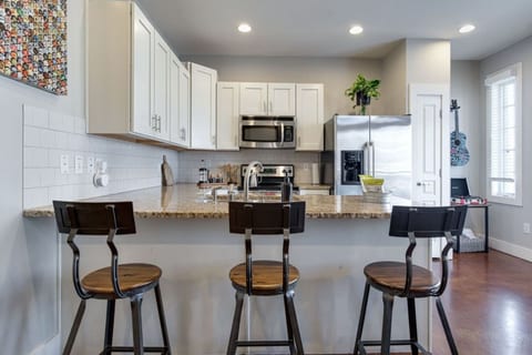 Breakfast Bar in Fully Stocked Kitchen