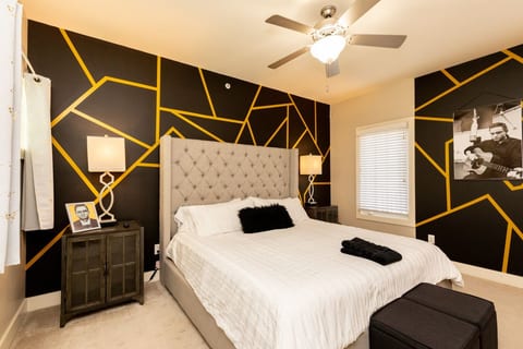 Master Bedroom with King Bed, En-suite Bathroom, Private Balcony, and Desk