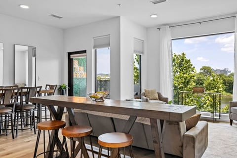 Dining Area with Barstools and Dining Table