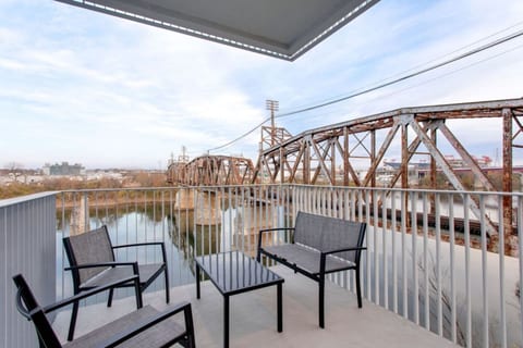 Balcony living space with view of the Cumberland River