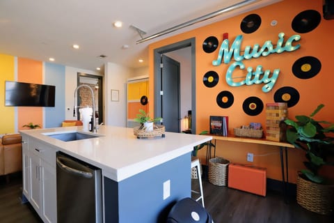 Prep meals at the spacious kitchen island while enjoying the retro, colorful decor