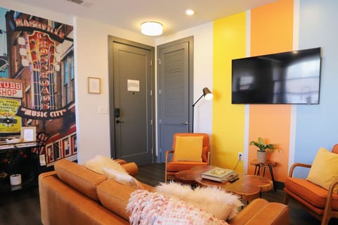 Unwind in style with ample comfortable seating and curated mid-century retro vibes