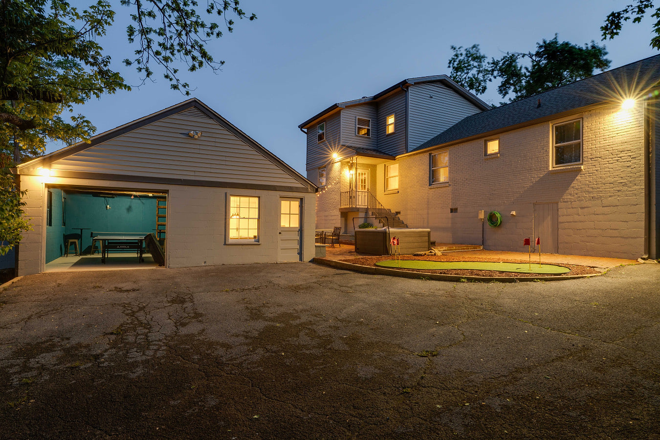 : Private backyard oasis featuring an outdoor game space and plenty of room to hang out. ✨