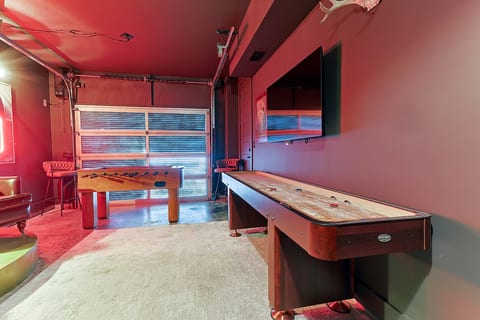 “Garage turned Speakeasy – shuffleboard, darts & more!”