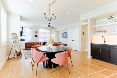 Open floor plan connecting the stylish living lounge and kitchen. 🏡