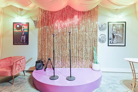 Dedicated glamorous photo-ready wall complete with micro-phones. 🎤