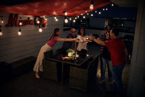 Raise a glass with friends.