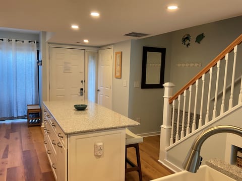 Bench seat to take off shoes and open staircase