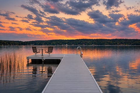 Enjoy serene lake views from your private dock at The Dragonfly Cottage. Perfect for fishing, boating, kayaking, or relaxing, this peaceful spot on Intermediate Lake offers a tranquil escape with stunning sunsets and calm waters.