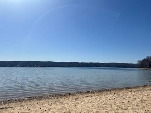 Enjoy your own private, sandy beach with shallow entry into Intermediate Lake.