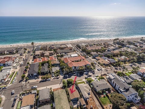 Home is located one block from the famous Tamarack Surf Beach.