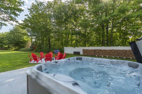 Seavey Compound: Large Irrigated Fenced-in Backyard includes (2) 7 person hot tubs (maintained by a Professional Hot Tub Company), fire pit, yard games, (2) oversized patios, (2) Weber grills, outdoor dining tables and a swing set