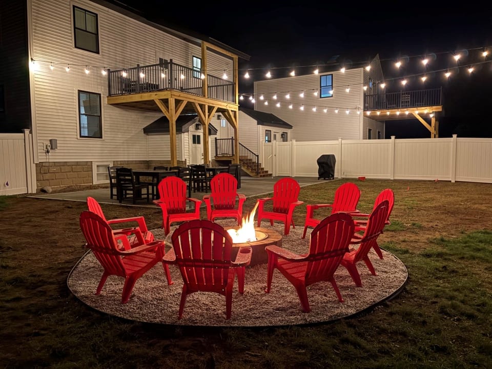 Big House Backyard: Complete with a firepit, large patio with a weber grill and two large outdoor tables, yard games, and bistro lights that light up a huge over 1/2 acre flat fenced in yard for the kids and dogs to run around!