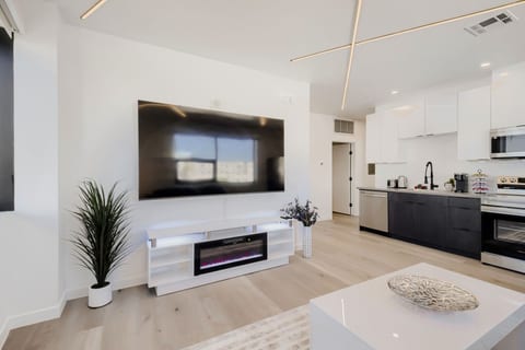 85" TV and Fireplace