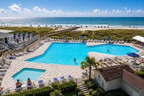 Indulge in the ultimate beachfront getaway at our beautiful oceanfront resort, home to the largest pool on Hilton Head Island. 

Come for the views, stay for the vibe—this is where unforgettable memories begin.