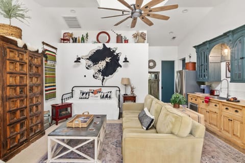 Lovely curated decor. Vaulted dormer creates light and volume yet still so cozy.