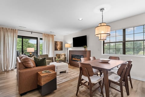 The open living and dining area keeps everyone connected, with seating for six at the dining table.