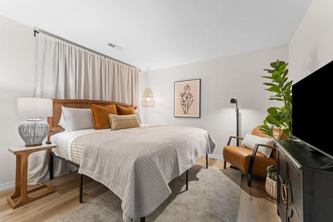 The second private bedroom also has a king bed, room-darkening curtains, and a 43-inch Roku TV with cable.