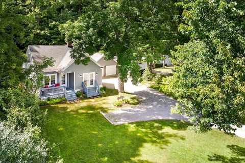 Charming home on 1.8 acre wooded lot. 2 car detached garage, plenty of parking, front and back yard.