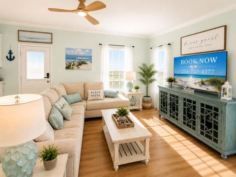 Relax after a day at the beach in the spacious and open living room area