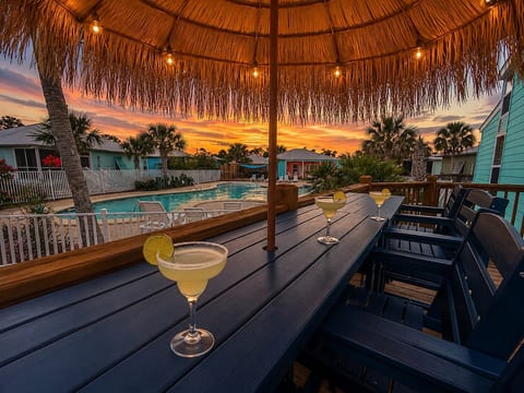 Enjoy cocktails or a meal while overlooking the resort style pool