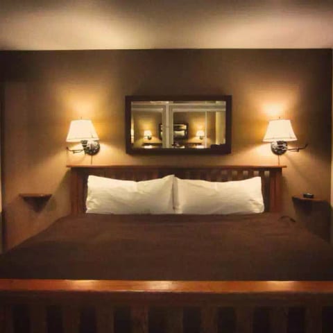 Master Bedroom: Clean lines and cozy comforts with this King size bed. Attached to the Master Bedroom is a full bathroom with tub/shower.