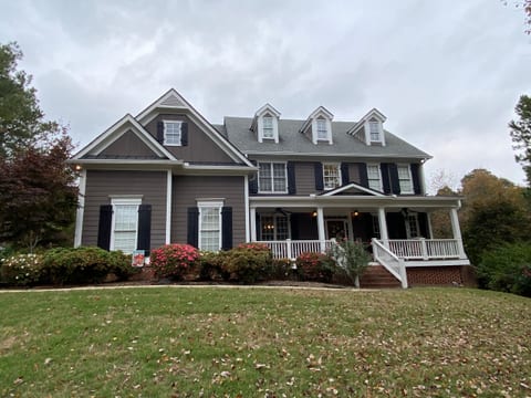 Exterior of the Wilson's home. Enter on the side of the house by driveway.