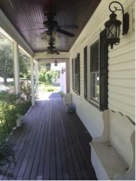 Enjoy the shade and breeze from the fans on the front porch.
